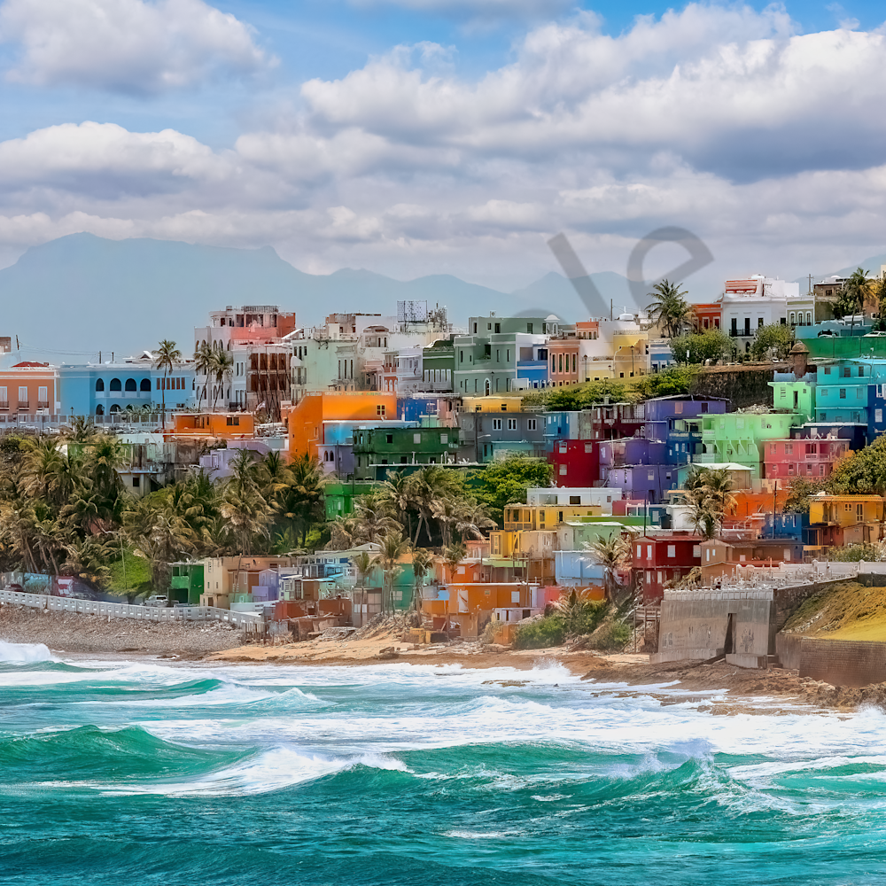 Crashing waves and ocean with colorful houses puerto rico q8wuzs