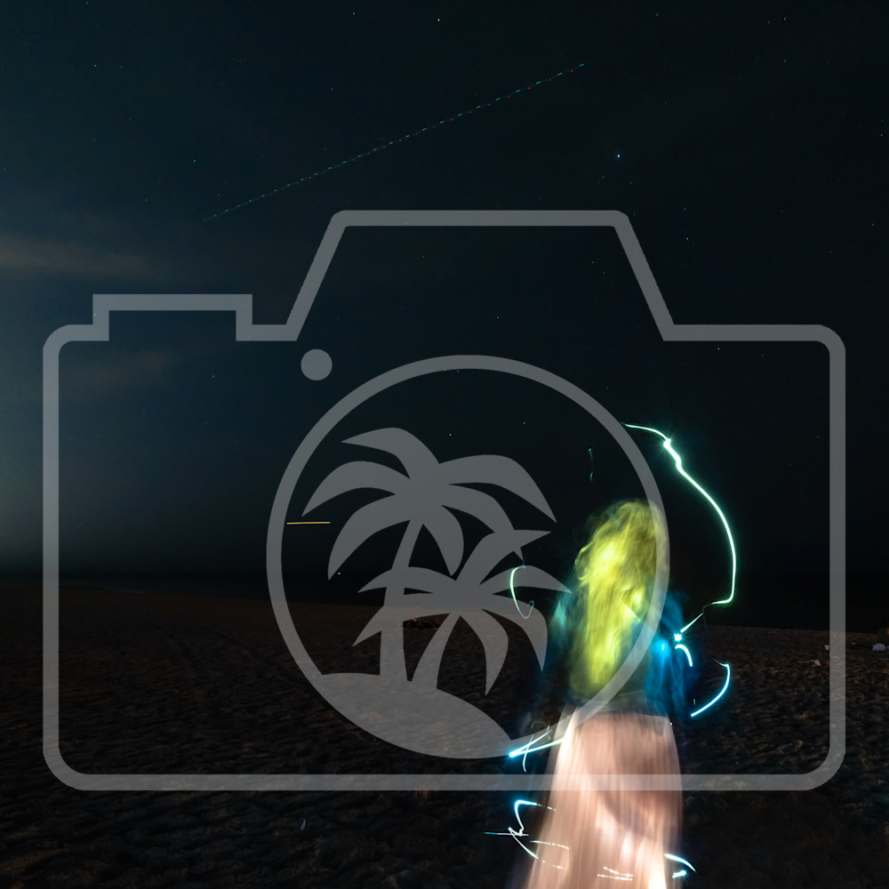 Self portrait on the beach with a flashlight iouysn