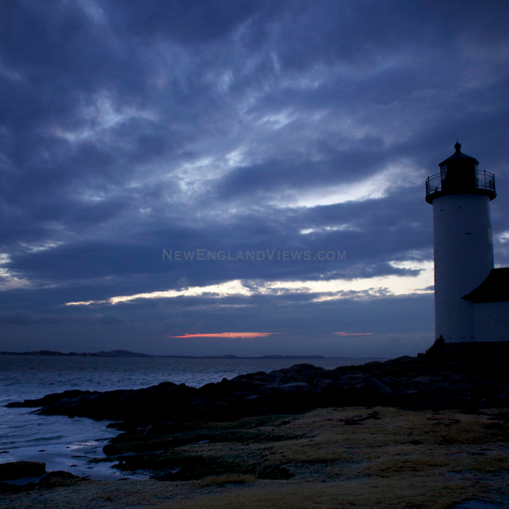 annisquam lighthouse beach sunset dark clouds seascape gloucester