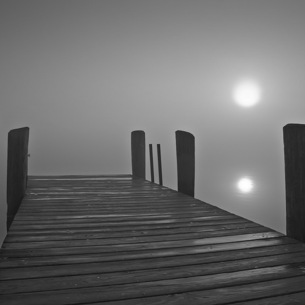 Sunrise over essex dock in fog icczmk