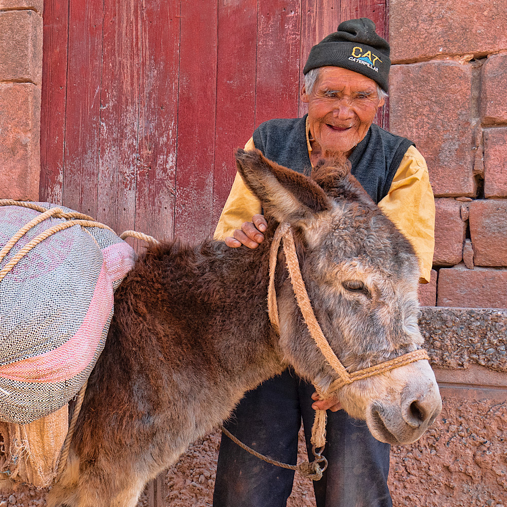 Peruvian man and his burro i0rcjg