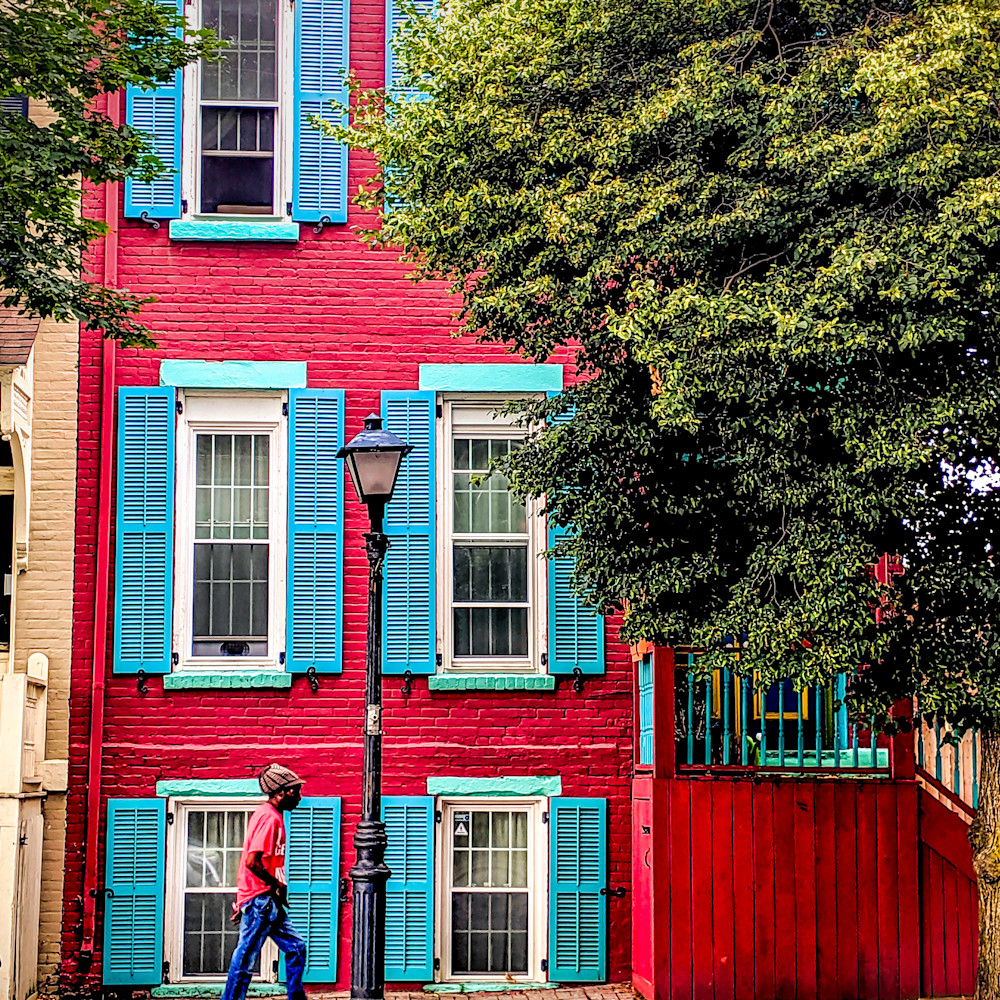 Man walking in front of red house   15x20 uyt8ym