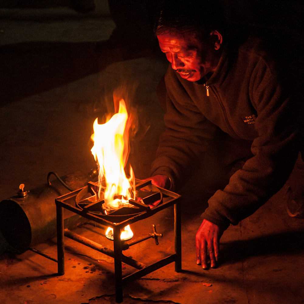 Man starting stove   kathmandu npaiiz