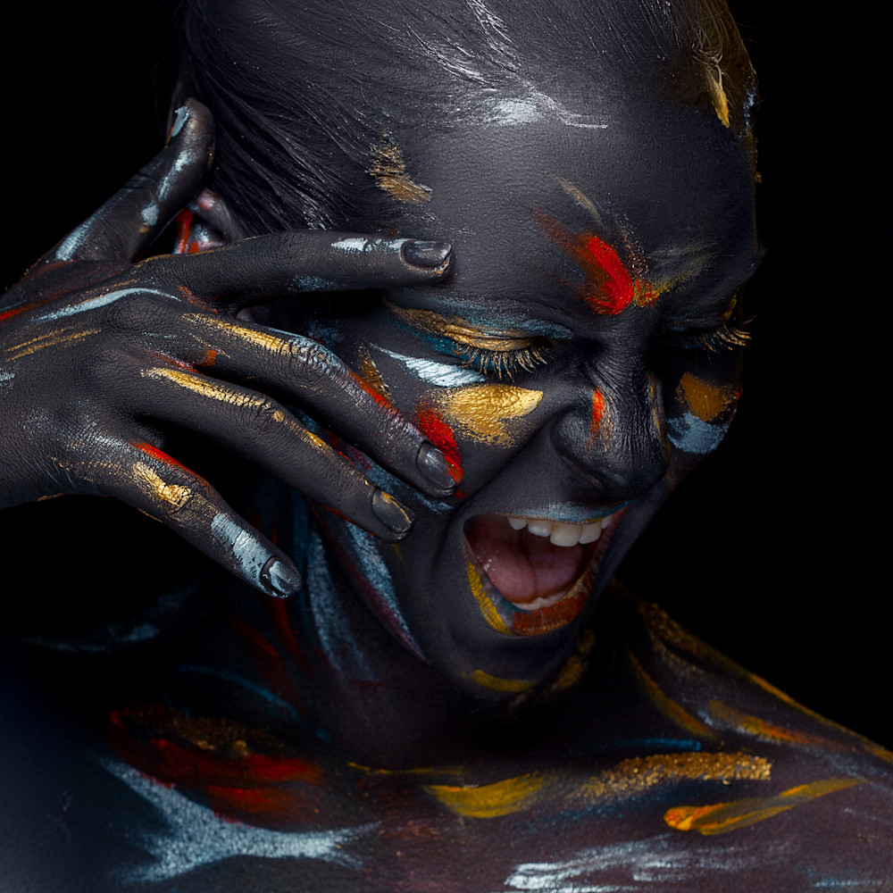 Portrait young woman who is posing covered with black paint soodxh