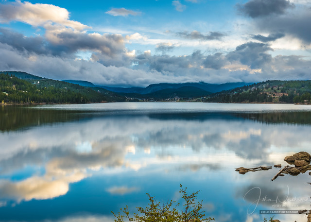 Photograph of Boulder Reservoir with Clouds Reflecting on Waters