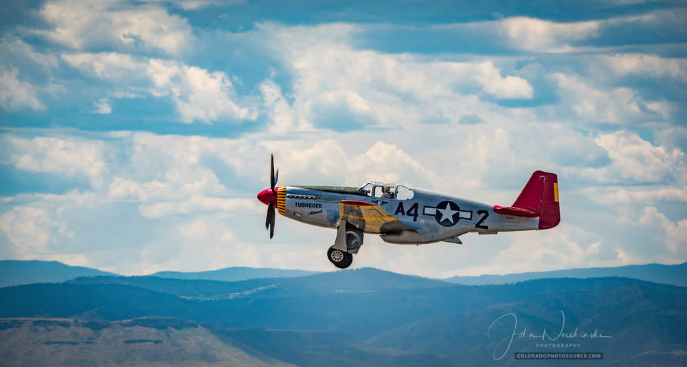 Photo of Tuskegee Airmen P-51C Mustang in Fight Over Colorado Rocky Mountains