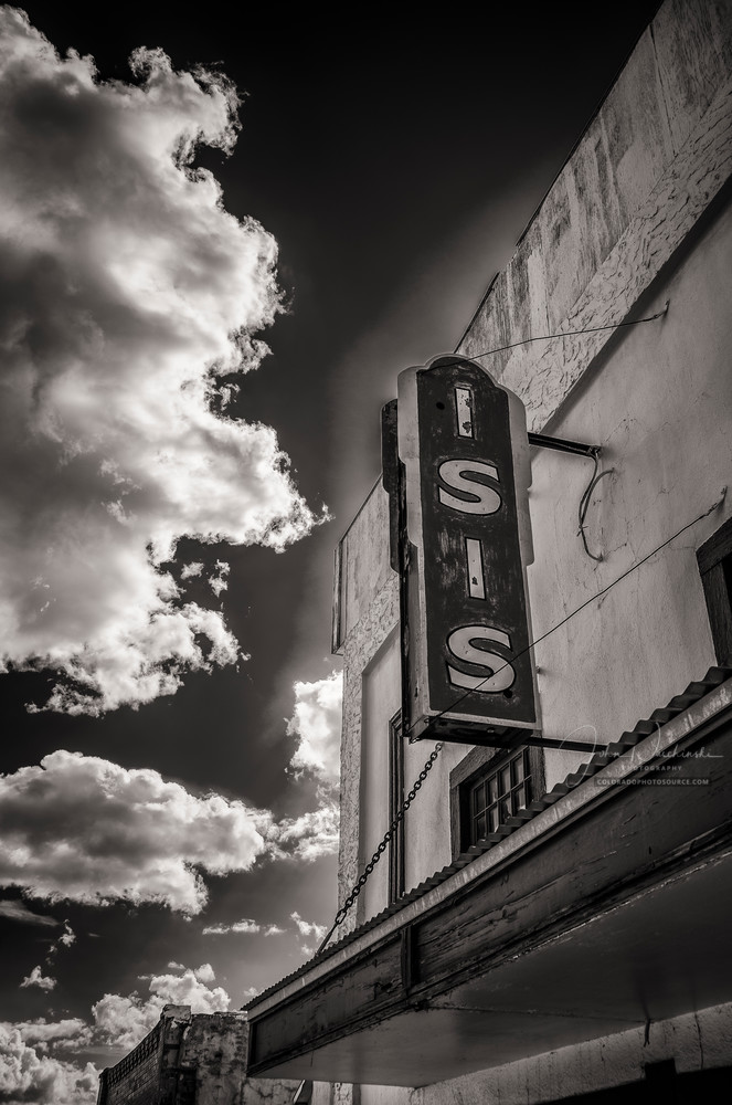 Vertical B&W Sepia Toned Photo Old Isis Movie Theater Historic Downtown Victor Colorado.