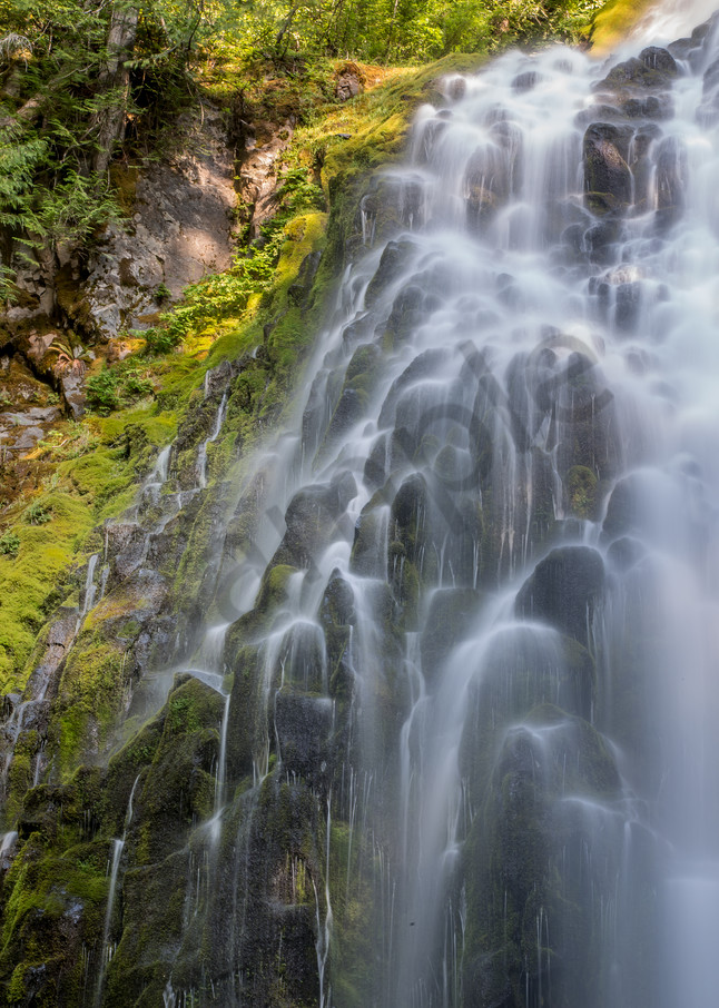 Lacy waterfalls over basalt rocks photo for sale by Barb Gonzalez Photography