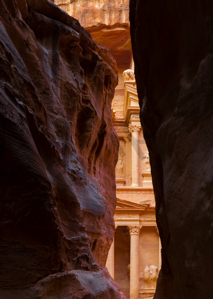 Petra, Jordan, looking through a narrow canyon at the Treasury
