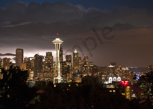 Lightning flash behind the downtown Seattle skyline, during a storm, Seattle, Washington
