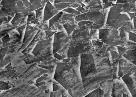 Black and white abstract of fractured ice