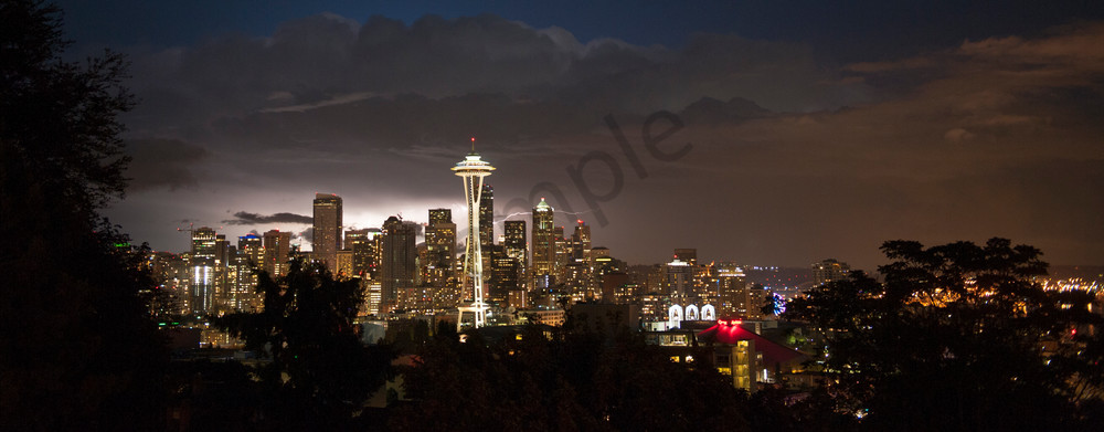 Lightning flash behind the downtown Seattle skyline, during a storm, Seattle, Washington