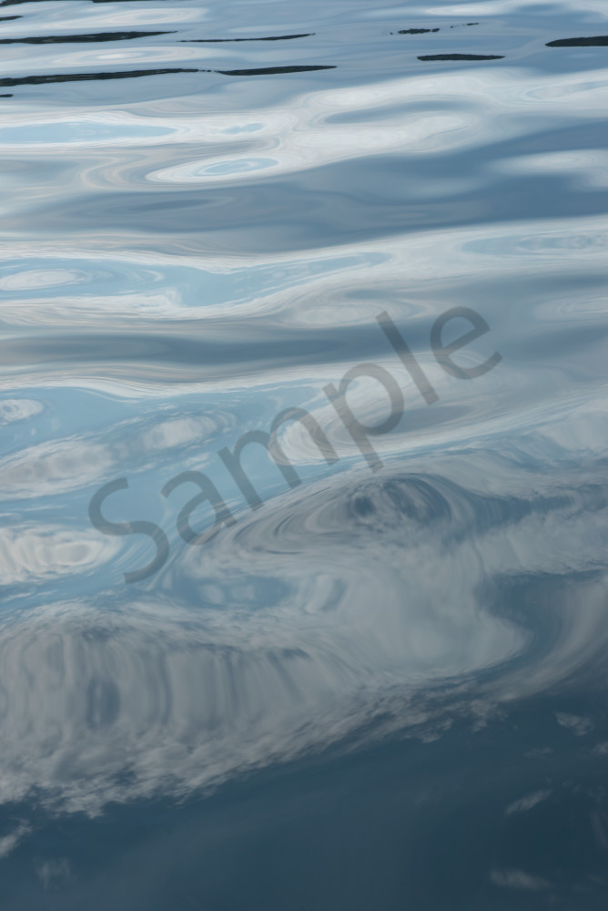 Abstract reflection of cloudson the surface of water, Seattle, WA