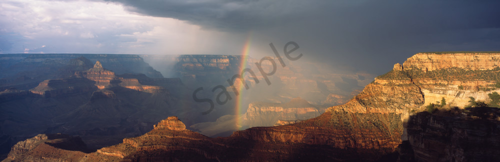 Rainbow and Summer monsoon rain storm over Grand Canyon from Mather Point, Grand Canyon National Park, Arizona