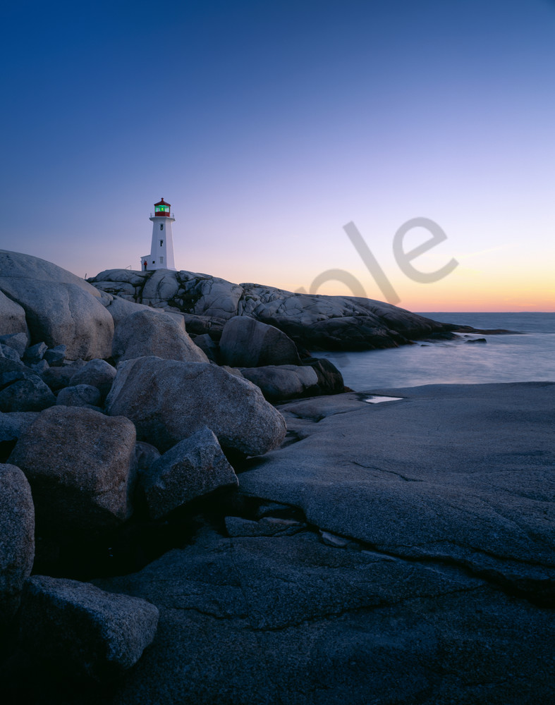 Peggy's Cove lighthouse on the rugged coast of Nova Scotia, Canada