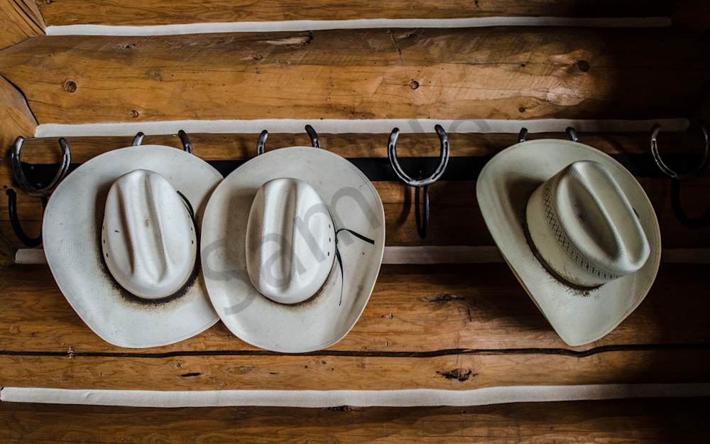 Cowboy Hats in Log Cabin Photo by Barb Gonzalez Photography
