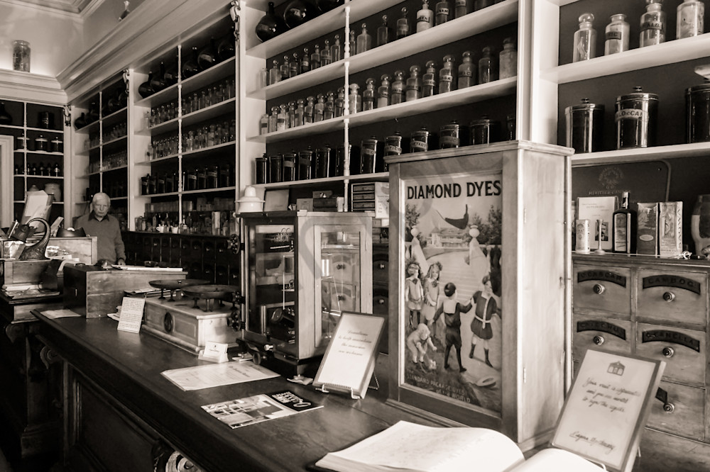 Black & white architectural photograph of an antique apothecary store in Niagara-On-The-Lake, for sale as fine art by Sage & Balm 