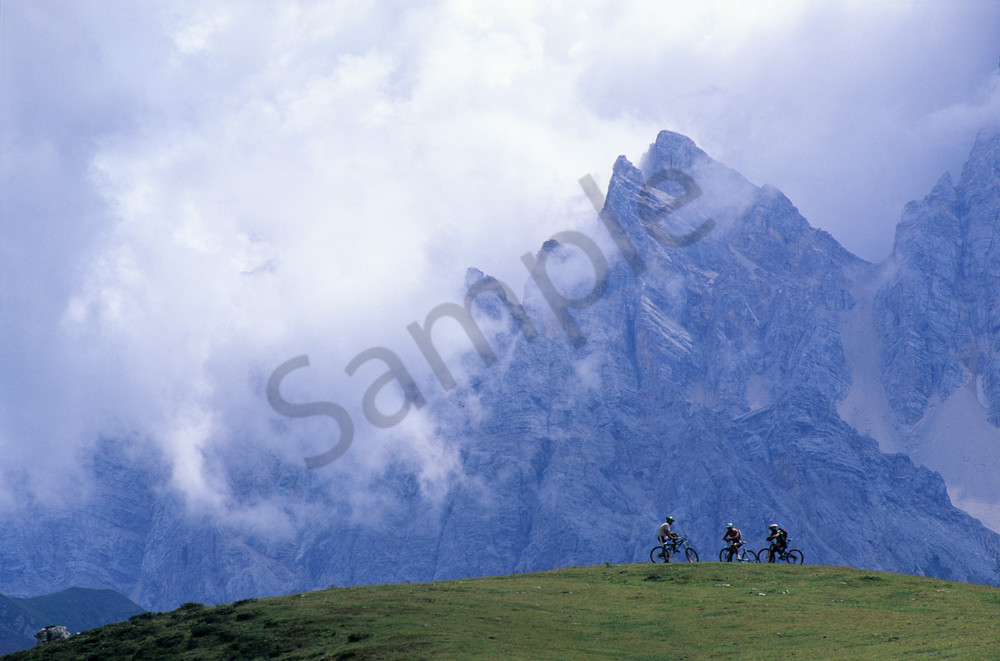 Mountain bikers taking in the view, Dolomites, Italy