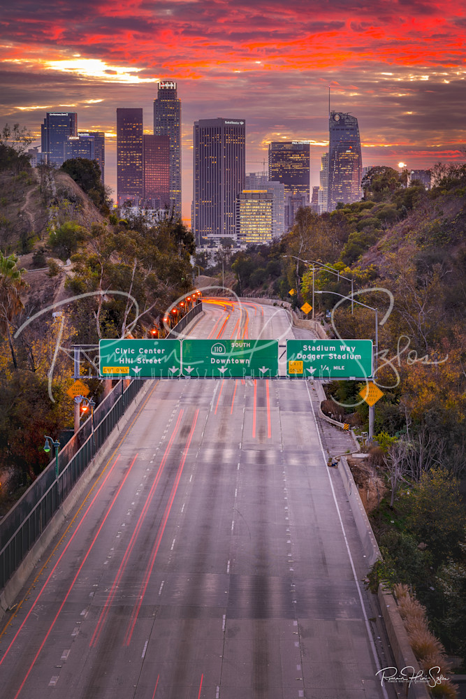 "SUNSET OVER THE CITY: PARK ROW BRIDGE VIEW OF DOWNTOWN AND THE 110 FREEWAY"