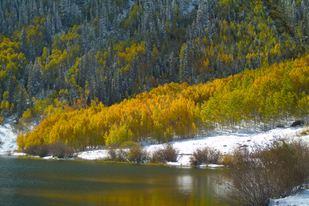 mountain light images crystal lake on red mountain pass in fall after an early snow. southwestern colorado