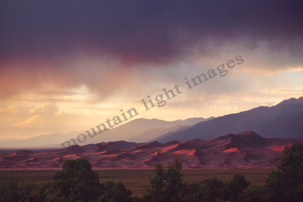 mountain light images great sand dunes park summer sunset with storm clearing off