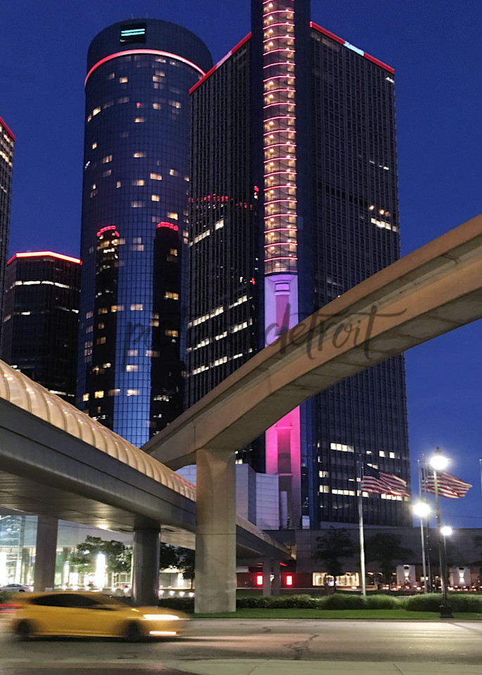 RenCen at night with taxi