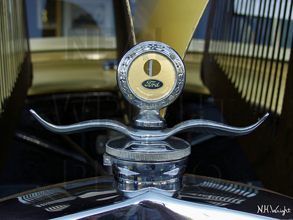 Reflections that Surround an Antique Ford Hood Ornament
