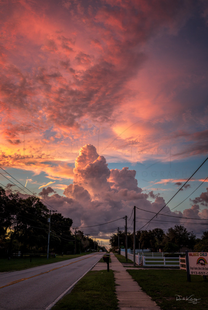Pink cotton candy clouds decorate the sky in this wonderful photographic art work | photographs art