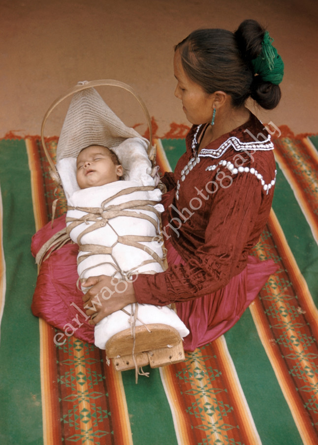 Woman on Blanket with Child in Cradleboard