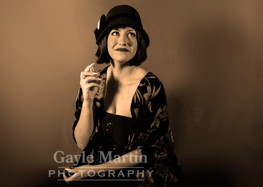 Studio Portrait Of Woman Holding A Perfume Bottle Photography Art | gaylemartin