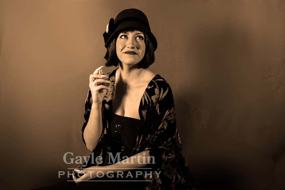 Studio Portrait Of Woman Holding A Perfume Bottle Photography Art | gaylemartin