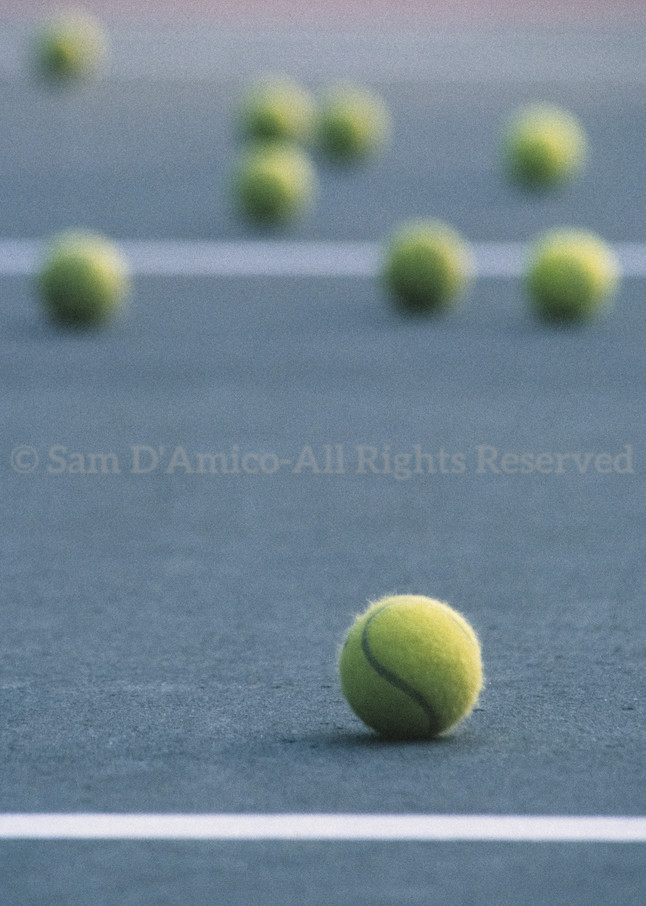 Tennis Balls On A Tennis Court During Practice