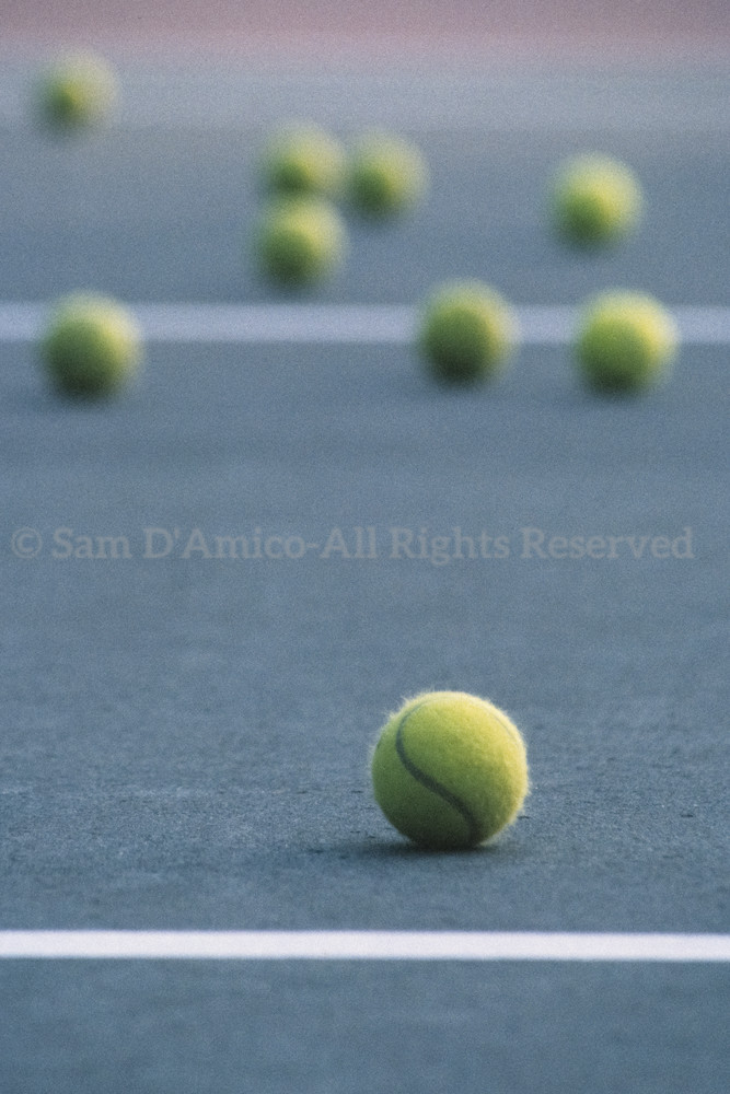 Tennis Balls On A Tennis Court During Practice