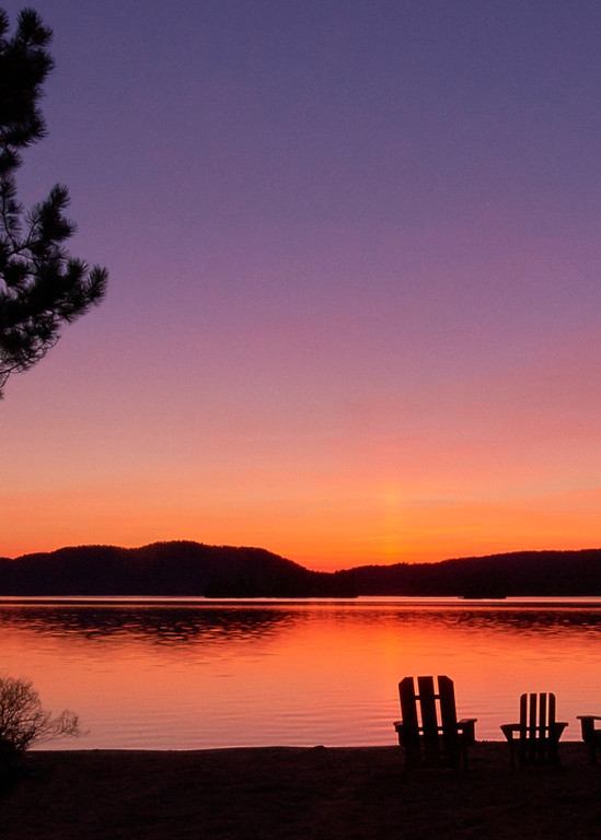 4th lake sunset with adk chairs in the Adirondacks