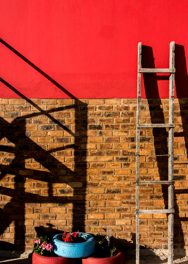 Ladder on a red wall, Lake Tota