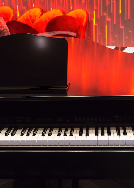  Photograph of a Piano, Colorful Abstract Light on beautiful black piano. 