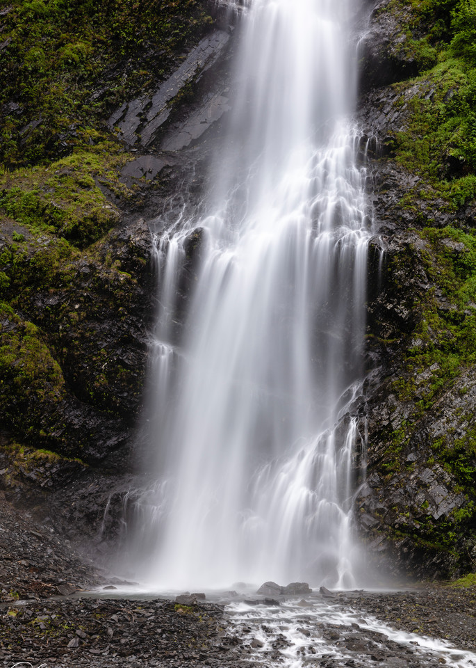 Long exposure of base of Bridal Veil Falls in Keystone Canyon near Valdez in Southcentral Alaska. Summer. Morning.