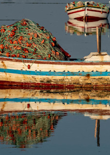 Traditional fishing boats reflection pano