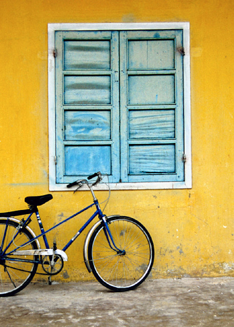 Vietnam bike by Yellow wall