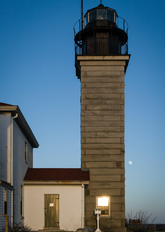 Beavertail Lighthouse in Jamestown, Rhode Island, at sunset. The first  lighthouse was built on this spot in 1749; the present lighthouse dates to 1856.