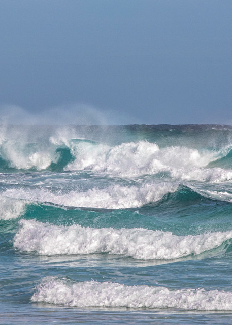 Breaking waves rolling into shore. Australia.
