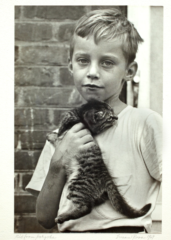 Photograph of Kid with Cat