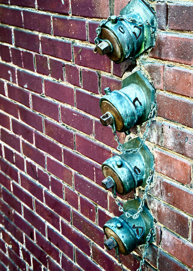 Four Standpipes In Brick Wall Photography Art | Pacific Coast Photo
