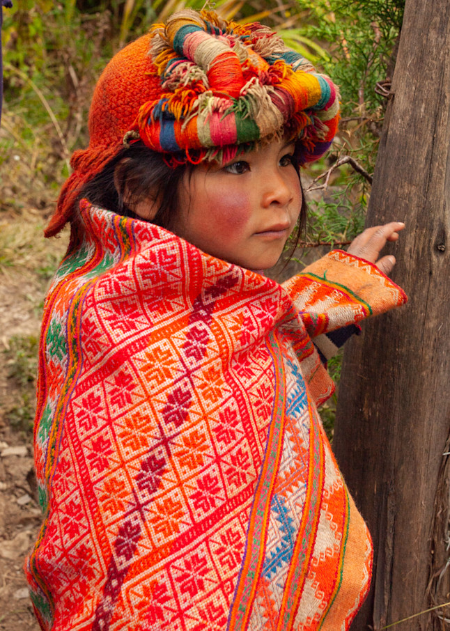 Child in colorful traditional dress in Peru | Nicki Geigert