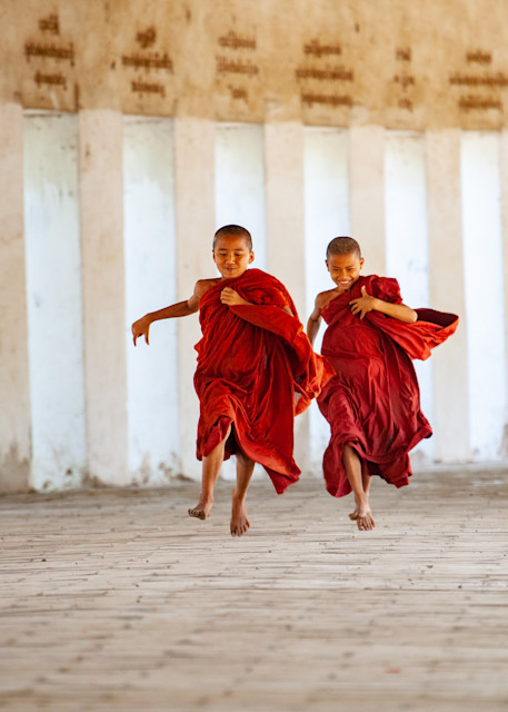 Boys running to lessons at a Pagoda in Myanmar | Nicki Geigert