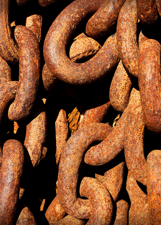 Rusty, heavy chain with rust color and texture