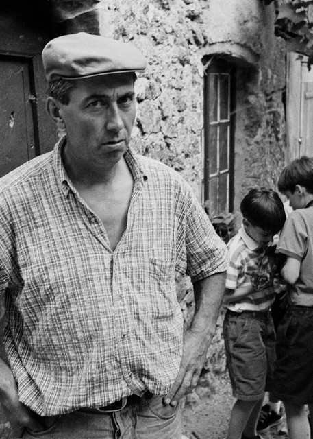 Les Vignolles, France - 30 July 1998. A farmer and his children outside their home near Les Vignolles in the Cécvennes in the south of France. His wife is a cheesemaker, and makes pelardon, a local goat cheese.