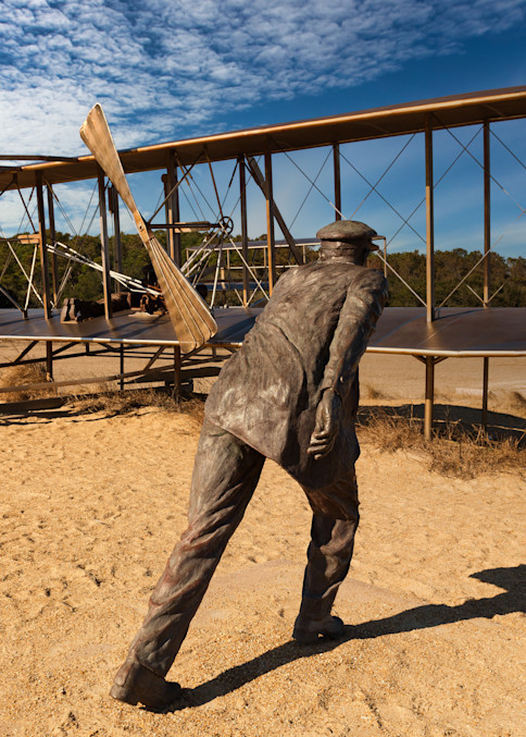 Part of a tableau of bronze statues depicting the first successful, sustained, power flight of a heavier-than-air machine -- lasting just 12 seconds -- at the the Wright Brothers National Memorial in Kill Devil Hills, North Carolina.  From 1900 to 1
