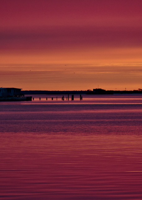 Predawn seascape of tranquil waters with a mauve hue