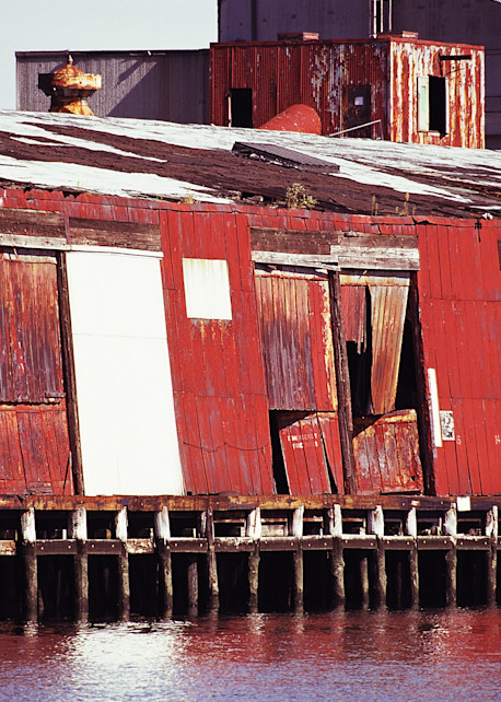 LOST IN BROOKLYN: The Red Pier

The red pier was located at the end of Hoyt Street in the Gowanus Canal. It had a stark beauty that came from the streaked red paint, filled with rust. To me, it was a graphic symbol of how the canal had been abando